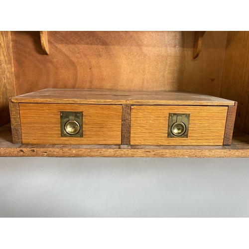 846 - A mid 20th century oak smokers cabinet with two internal drawers and shelf - approx. 36cm high x 51c... 