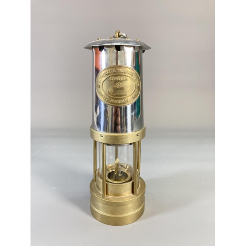 848 - A reproduction E. Thomas & Williams Ltd. brass miners lamp - approx. 24.5cm high