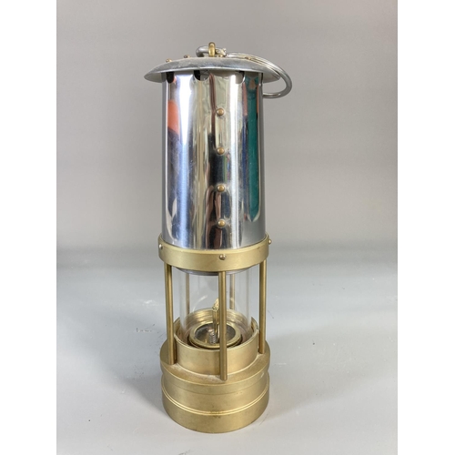 848 - A reproduction E. Thomas & Williams Ltd. brass miners lamp - approx. 24.5cm high