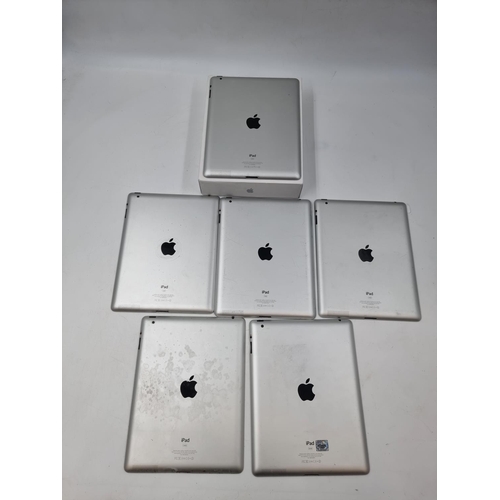 1491 - Six Apple iPad A1395 tablets, one boxed with plug and cable