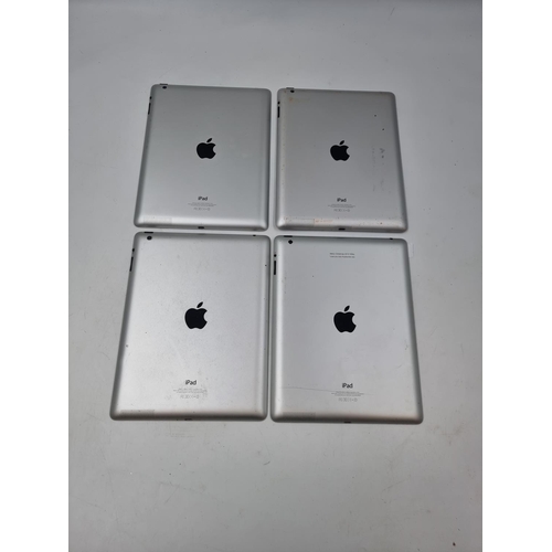 1493 - Four Apple iPad A1458 tablets