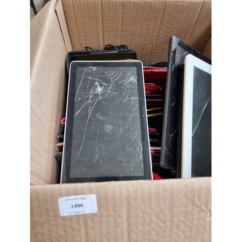 1496 - A box containing a collection of tablet cases and tablets for spares or repair