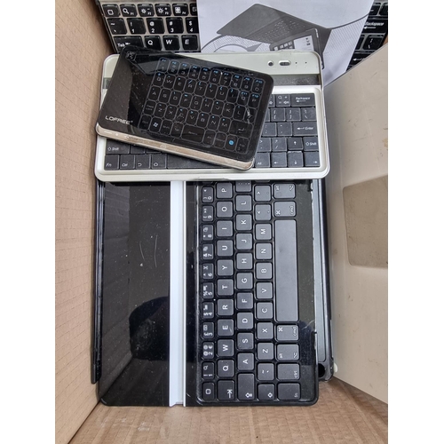 1497 - A box containing a collection of tablet keyboards and Apple tablets for spares or repairs