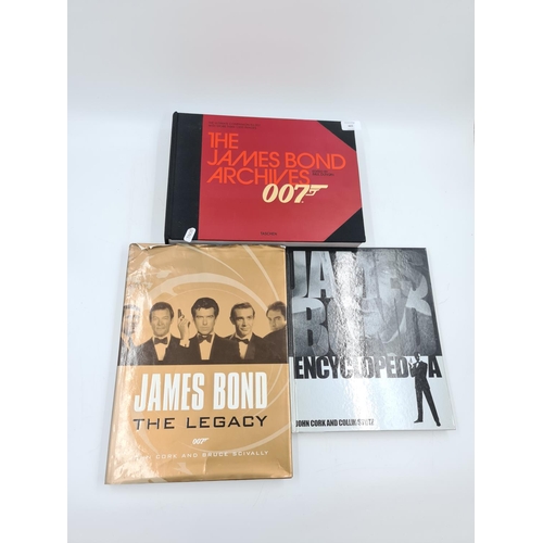 796 - Three 007 hardback books, one James Bond Archives edited by Paul Duncan, one James Bond Legacy and o... 