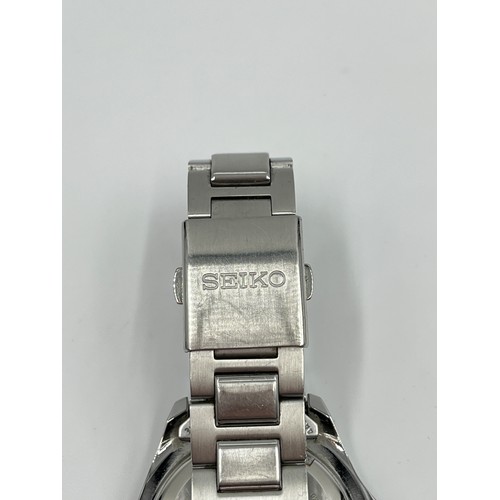 2418 - A boxed Seiko Kinetic 100M stainless steel men's wristwatch - model no. 0N2516