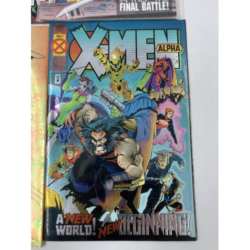 774 - Four Marvel X-Men comics, three with chromium covers - Alpha, Omega, Prime and one Anniversary Issue... 