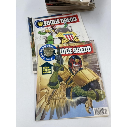 787 - A large collection of assorted comics to include 2000AD, Judge Dredd etc.