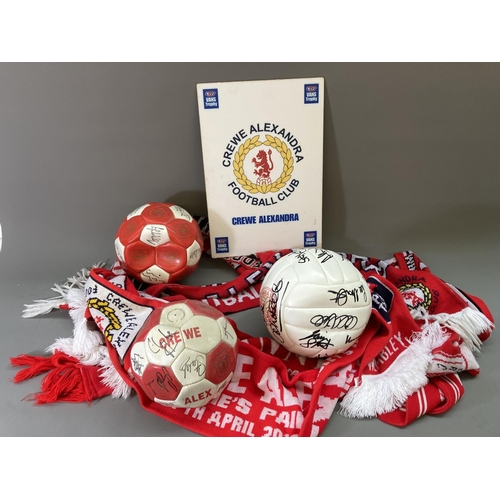 790 - A collection of Crewe Alexandra football memorabilia to include three signed footballs, five scarves... 