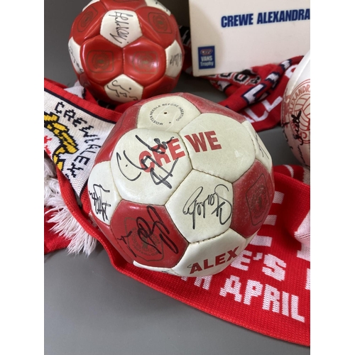 790 - A collection of Crewe Alexandra football memorabilia to include three signed footballs, five scarves... 