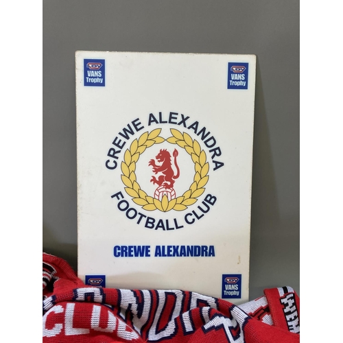 790 - A collection of Crewe Alexandra football memorabilia to include three signed footballs, five scarves... 