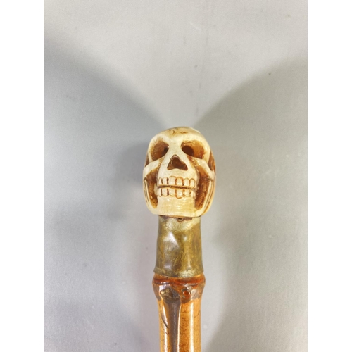 862 - A 19th century Memento Mori walking cane with carved bone skull top - approx. 76cm long