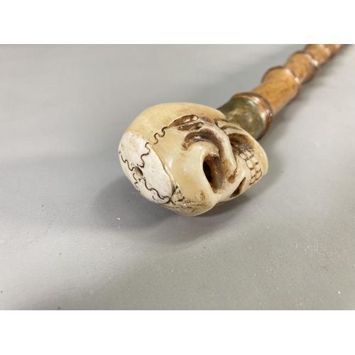 862 - A 19th century Memento Mori walking cane with carved bone skull top - approx. 76cm long