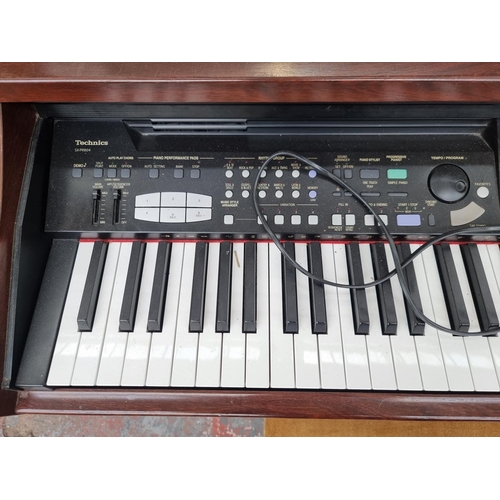 1393 - A Technics SX-PR804 electric piano with matching stool