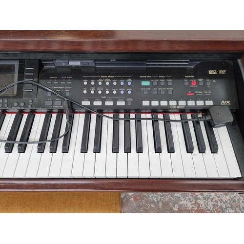 1393 - A Technics SX-PR804 electric piano with matching stool