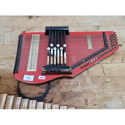 1396 - Three musical instruments, one vintage autoharp, one bongo drum and one small xylophone