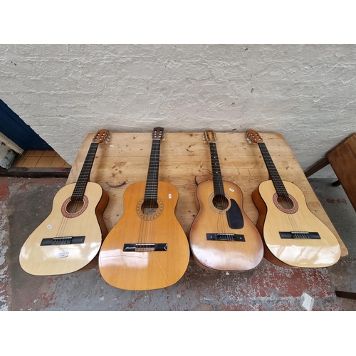 1402 - Four classical guitars, one Hohner MC-05 full size, two Eleca DAG-IN-36 ¾ size and one Audition ¾ si... 