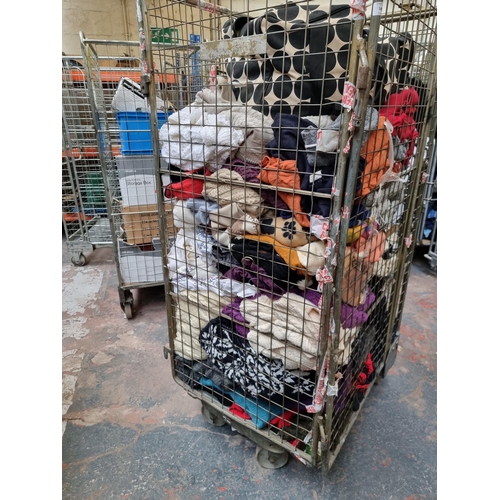 1719B - A large quantity of assorted clothing (cage not included)