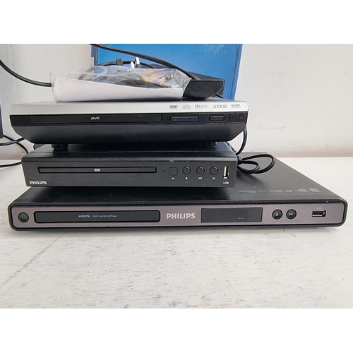 1429 - Five items to include boxed Philips TAEP200 DVD player with remote control, Logik LOGTV228 10