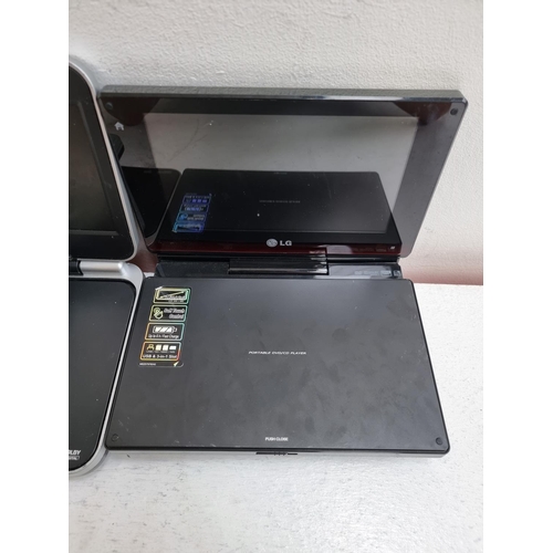 1433 - A collection of portable DVD players to include LG, Bush BDVD8380 and Wharfedale WDP-127