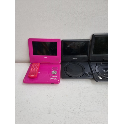 1434 - A collection of portable DVD players to include Curtis DVD7014UK, Alba CDVD7SWP with remote control,... 