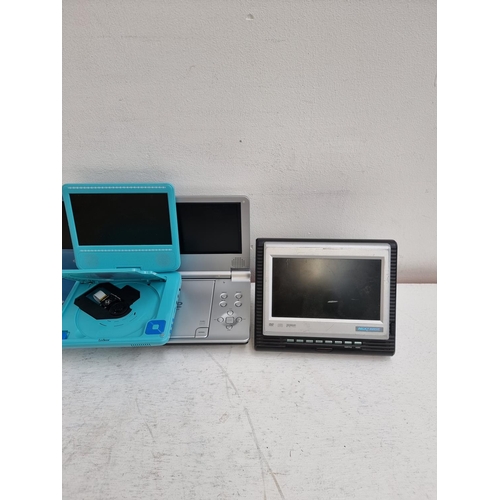 1434 - A collection of portable DVD players to include Curtis DVD7014UK, Alba CDVD7SWP with remote control,... 