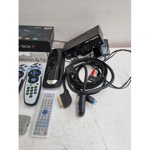 1435 - A collection of AV equipment to include boxed Sky Wireless connector, boxed MXQ Pro 4K TV box, Logit... 