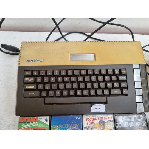 1478 - An Atari 800XL 8-bit home computer with DV-515 UK power supply, joystick and phonemark PM-4401A cass... 