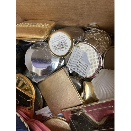 1799 - Two boxes containing assorted clocks and ladies compact mirrors