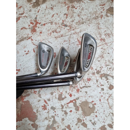 1753 - Five Wilson Fat Shaft golf clubs