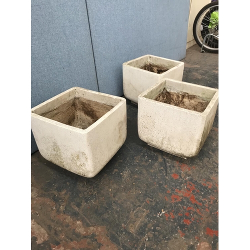 1704 - Three matching square fibre glass garden planters - approx. 32cm high x 36cm square