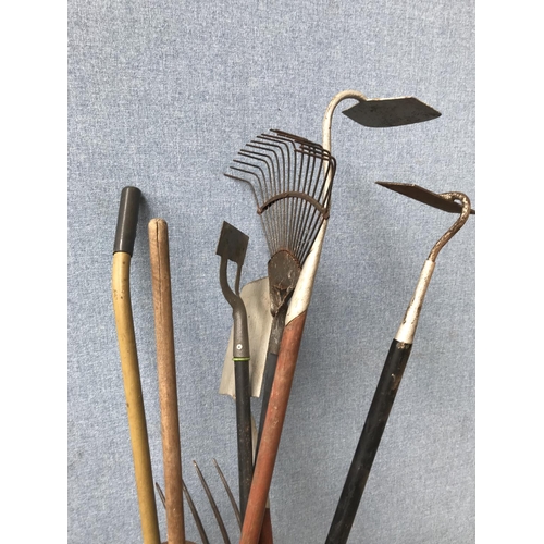 1705 - A collection of assorted garden tools