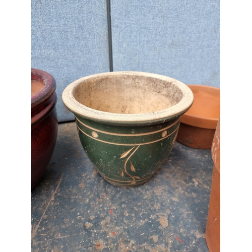 1710 - A collection of assorted garden plant pots