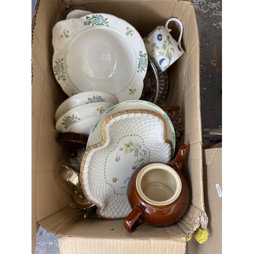 1764 - Three boxes containing a collection of assorted items to include Denby ceramic teapot, John Maddock ... 