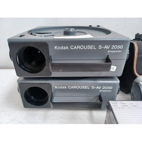 A collection of items to include two Kodak Carousel S-AV 2050