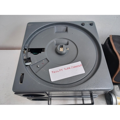 1255 - A collection of items to include two Kodak Carousel S-AV 2050 slide projectors, cased Canon UC8000 8... 