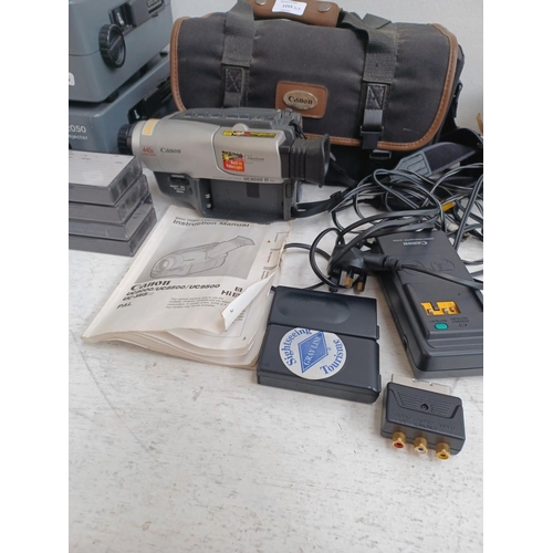 1255 - A collection of items to include two Kodak Carousel S-AV 2050 slide projectors, cased Canon UC8000 8... 