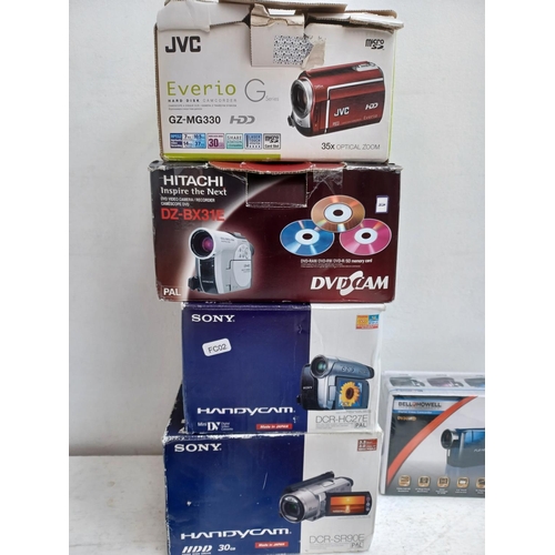 1263 - A collection of digital camcorders to include boxed and sealed Bell & Howell DV30HD, Vivitar DVR510N... 