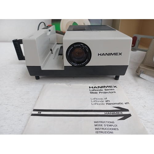 1265 - Two slide projectors, one Aldis 303 and one Hanimex La Ronde EFT with boxed round slide magazine and... 