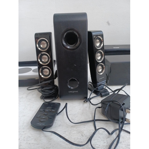 1267 - Three speaker systems, one Creative I-Trigue 3000i with remote control and power adaptor, one cased ... 