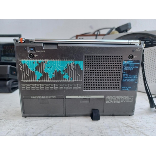 1269 - A collection of radios to include Sony ICF-7600D four band PLL synthesised receiver, cased Grundig T... 