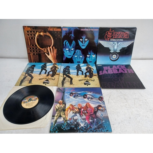 1330 - A collection of rock vinyl records to include Motorhead, Kiss, AC/DC, Black Sabbath, Hawkwind etc.