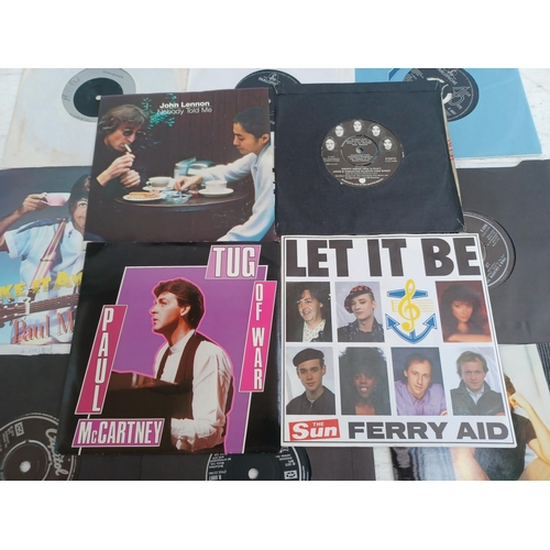 1345 - A collection of Beatles solo vinyl records to include Paul McCartney, John Lennon, Ringo Starr and G... 