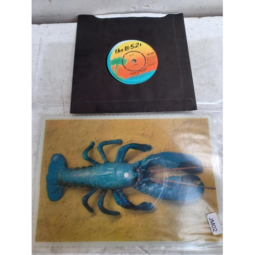 1359 - Four items, one The B-52's 'Rock Lobster' shaped picture disc (BFTL1), one Talking Heads 'Road To No... 