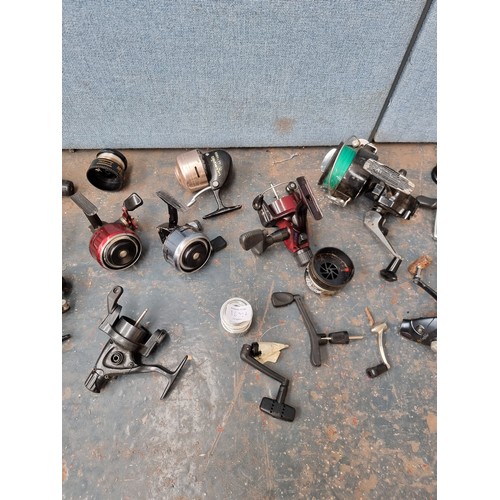 1632A - A collection of assorted fishing reels to include Abu 505 closed face, Intrepid Cresta with front dr... 