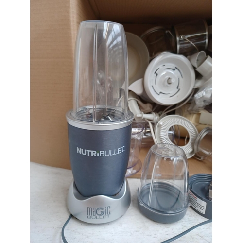 1550 - A box containing food processors, parts and attachments to include Nutribullet NB-WL011-23 etc.