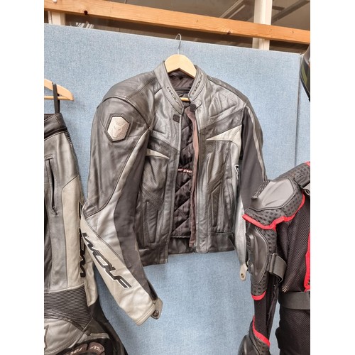 1630A - A selection of motorcycle clothing to include Wolf leather trousers and jacket - size 42, HJC IS.17 ... 