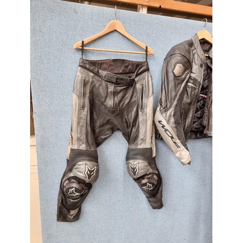 1630A - A selection of motorcycle clothing to include Wolf leather trousers and jacket - size 42, HJC IS.17 ... 