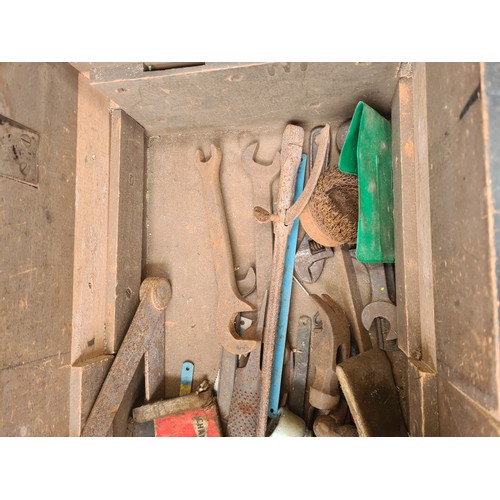 1681 - An early/mid 20th century ebonized pine tools chest containing vintage files, hammers, spanners etc.