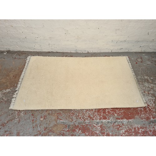 1180F - A Hand Made Carpets Ltd Behngal Plain Off White rectangular rug