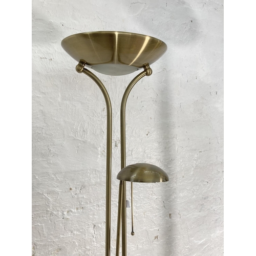 1178B - Two modern standard lamps, one brass effect - approx. 180cm high and one brushed steel effect with r... 